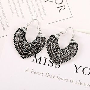 Retro Exaggerated Bohemian Alloy Carved Earrings